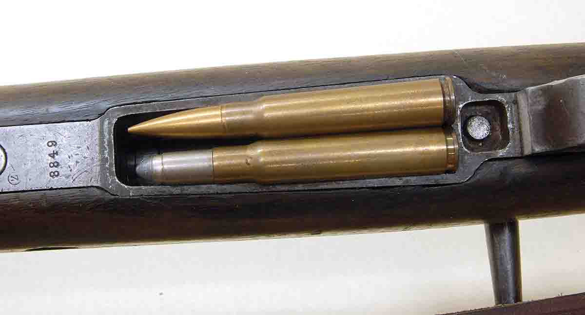 The 7.9x57 military round (top) and 8x60 (bottom) show why the 8x60 fits in a standard M98 Mauser magazine despite its longer case.